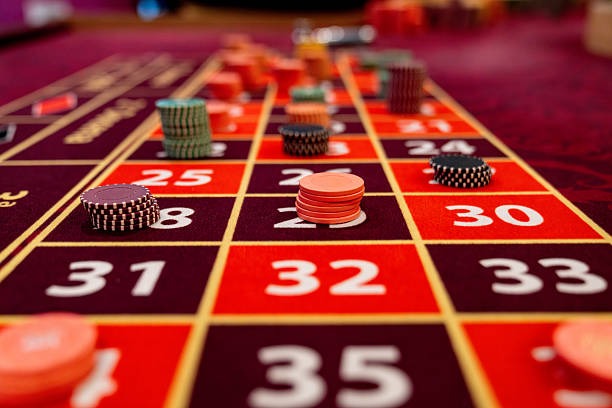 yudi100 game menu showing football markets, live dealer tables, and slots where reload credit can be applied